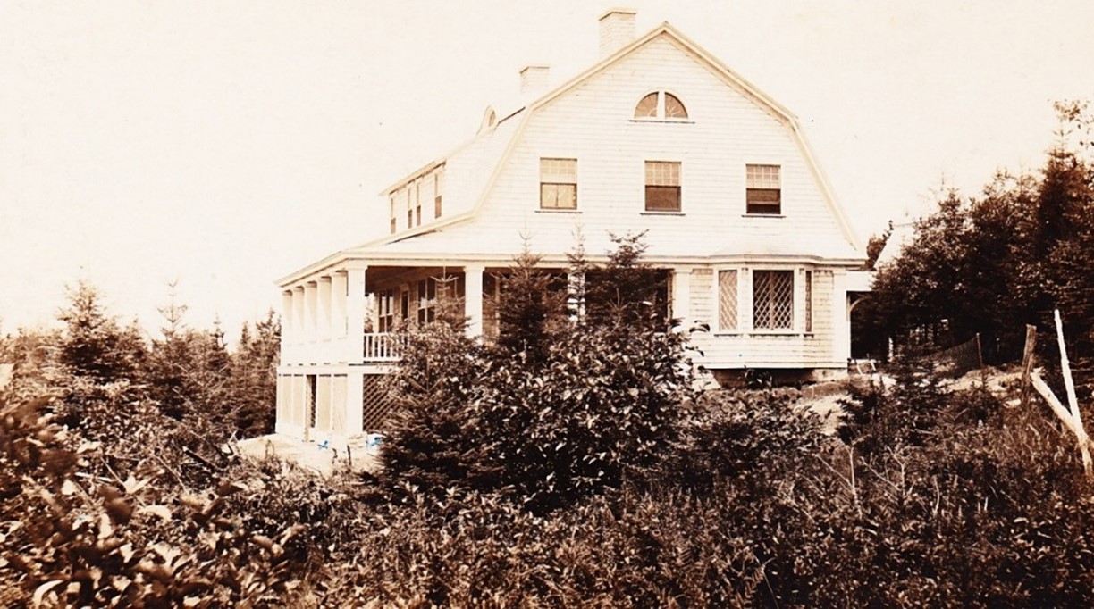 An early photo of the Lee cottage.