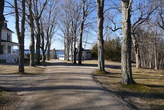A recent view of the home which is on the right at the end of Maple Ave.