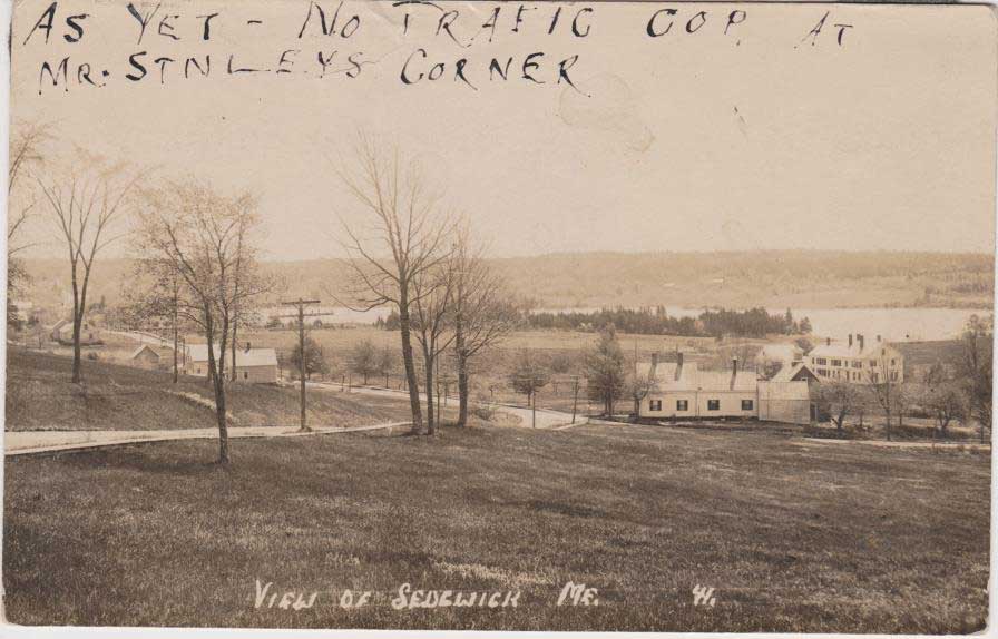 View of Sedgwick near Mean’s Hill.  Note on card-“I think this was taken on Means Hill, from in front of Albert Currier’s house.” The Byard home is in the distance.