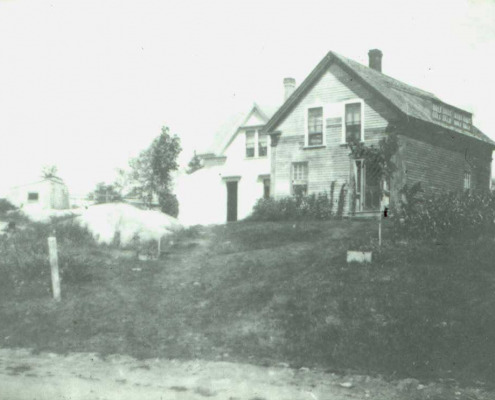 As Rock Hill once was—part of the building at the right was an old barn. It is said that Andrew Cooper had a blacksmith shop there and the Sons of Temperance met there.