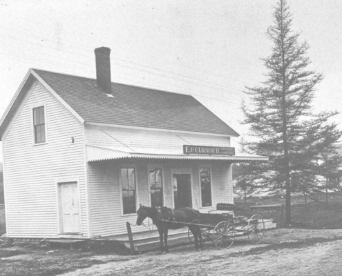 Ned Currier’s store was across from the Paine’s but you may recognize it as a familiar sight on the hill next to the Eggemoggin Baptist Church.