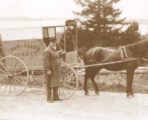 Jim Snow and his cart, a moving store. The meat was slaughtered in North Sedgwick and peddled by cart.