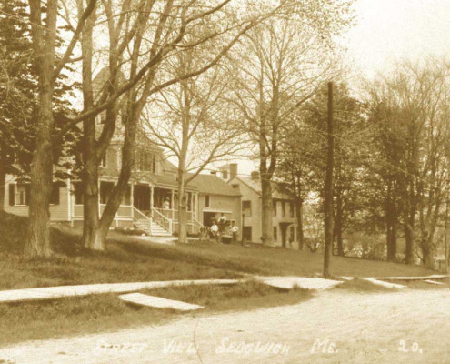 Street scene in Sedgwick village showing the Cavendish House and sidewalks