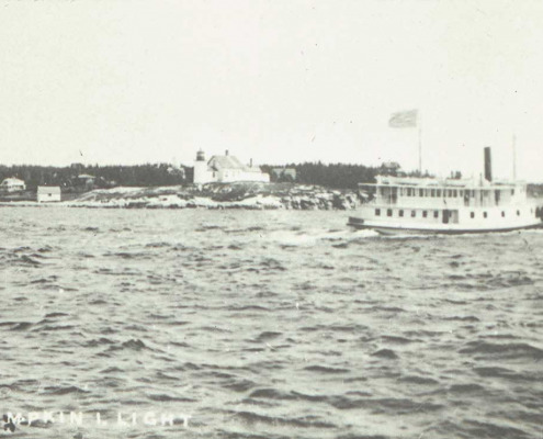 A steamboat passing Pumpkin Island