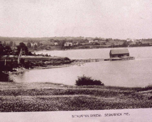 A coal wharf in the Benjamin River about where the town Dock is now