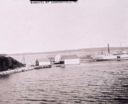 J. T. Morse at the steamboat wharf. This was the steamboat wharf and coal wharf which was gone soon after 1925 when they began shipping coal by land routes.