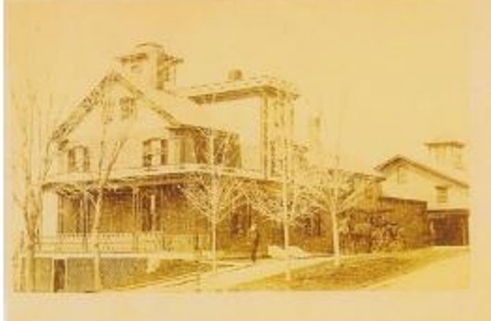 In this photo Wyer is standing on front of the house.