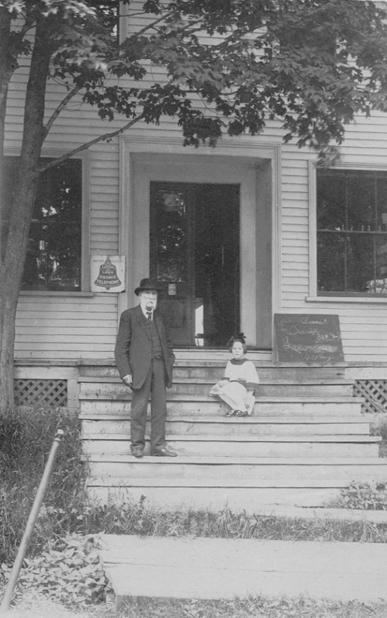 The Bell Telephone logo can be seen in the 1908 photo of Jasper and Catharine Clapp Sargent which was taken in front of Jasper’s store in Sargentville.