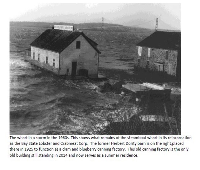 The wharf in a storm in the 1960s This shows what remains of the steamboat wharf in its reincarnation as the Bay State Lobster and Crabmeat Corp.