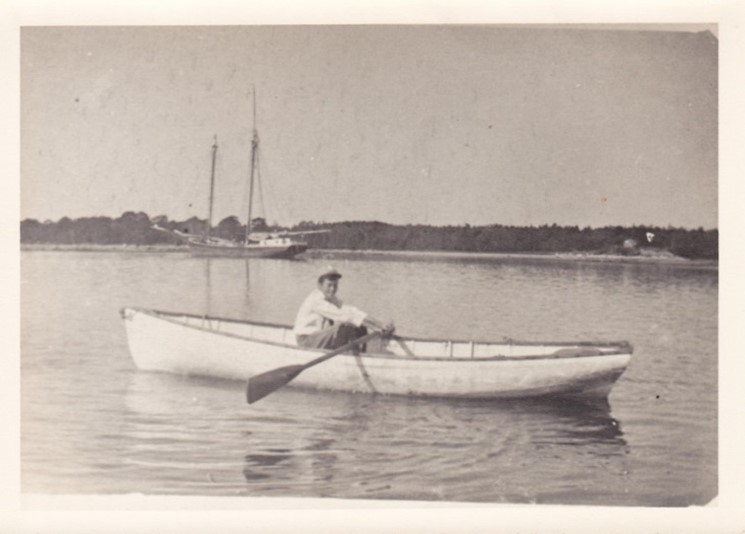Ronald Gower (father of Nancy G. Hitchcock) rowing in Billings Cove in the early 1900s