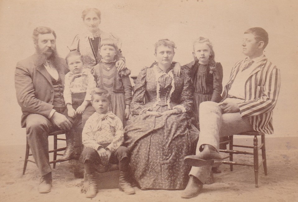 (L-R) Willian Dix Gower, his wife Lydia and their children, Ms. Philbrook and unknown child, Addison Sargent, son of Wyer and Maria Sargent.