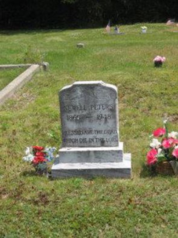 Sewell’s headstone in Forest Home Cemetery[4]