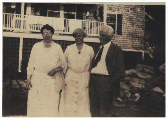 My grandparents, Catherine and Wilbur Smith, flanking an unidentified guest at Kill Kare circa 1920′s.