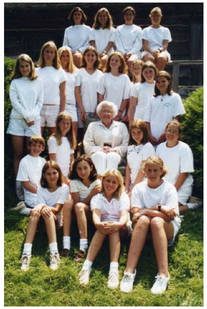 My mother, Grace McNeal, was affectionately called Mrs. Mac by generations of Four Winds campers. Here she is surrounded by some of her camp “grandchildren” – girls (and one boy – our son Ben on the left in the second row!) whose mothers and/or aunts were Four Winds campers before them.