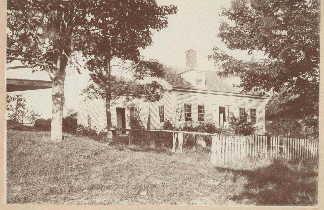 The Sawyer home in 1887. Mrs. Sawyer is standing in the driveway