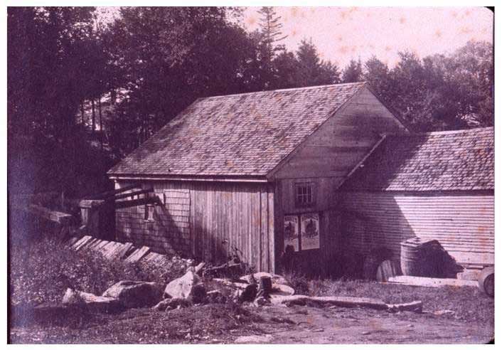 This is thought to be a photo of the grist mill behind Sargent’s Store in Sargentville.  An 1892 deed from Wyer Sargent to Henry Sargent (368/123) refers to it as the “Eaton Mill”.